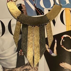 Gorgeous, gold and silver necklace.